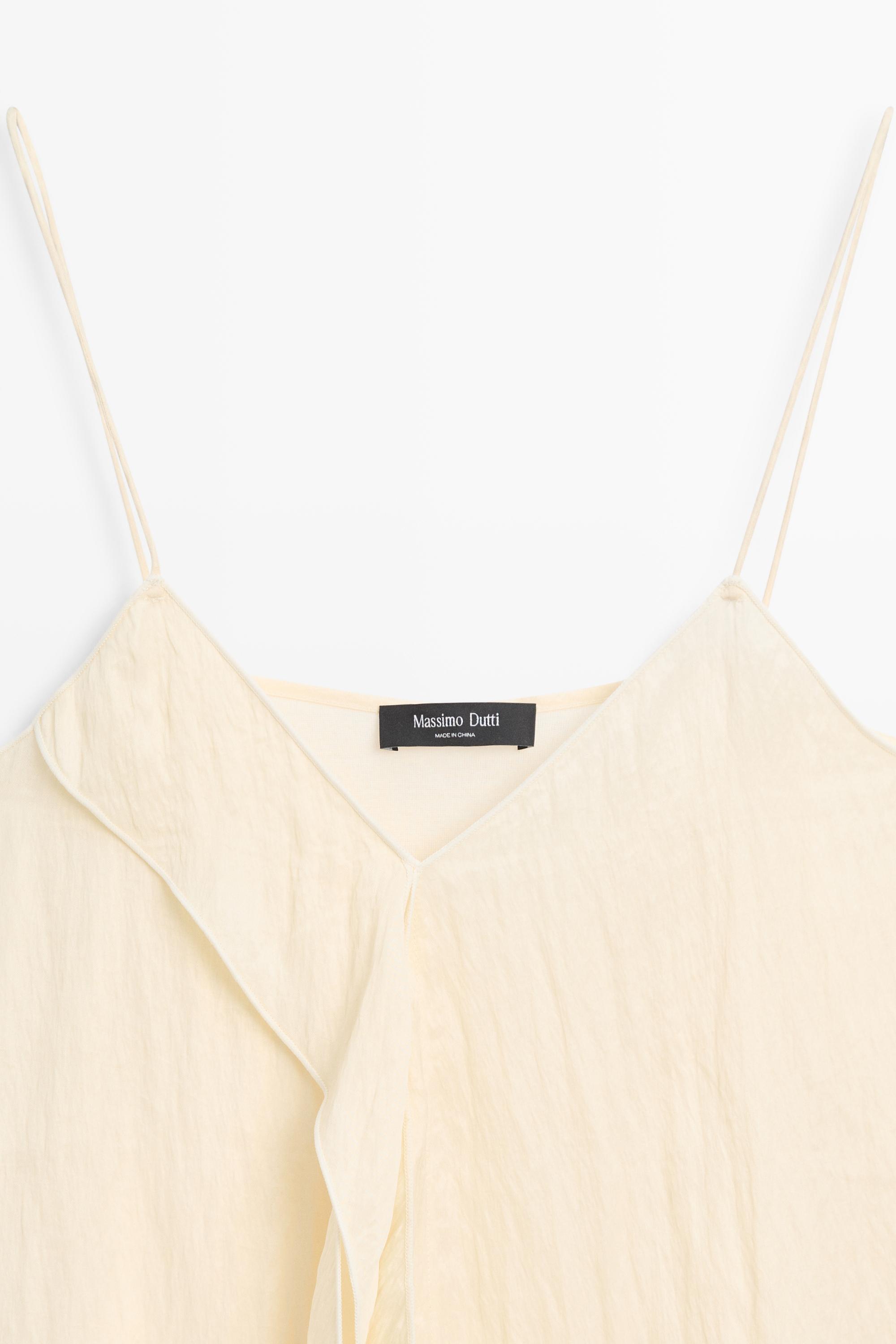 Strappy top with ruffle detail